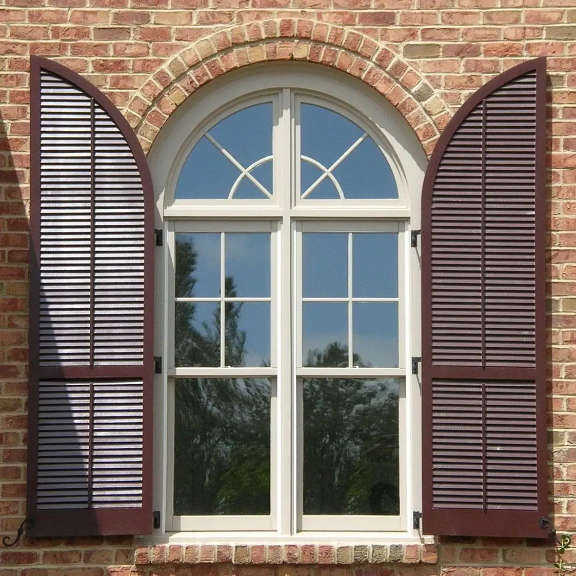 Exterior shutters for arched windows