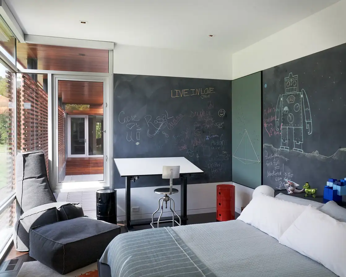 Spark your youngster’s creativity with a chalkboard wall in the bedroom