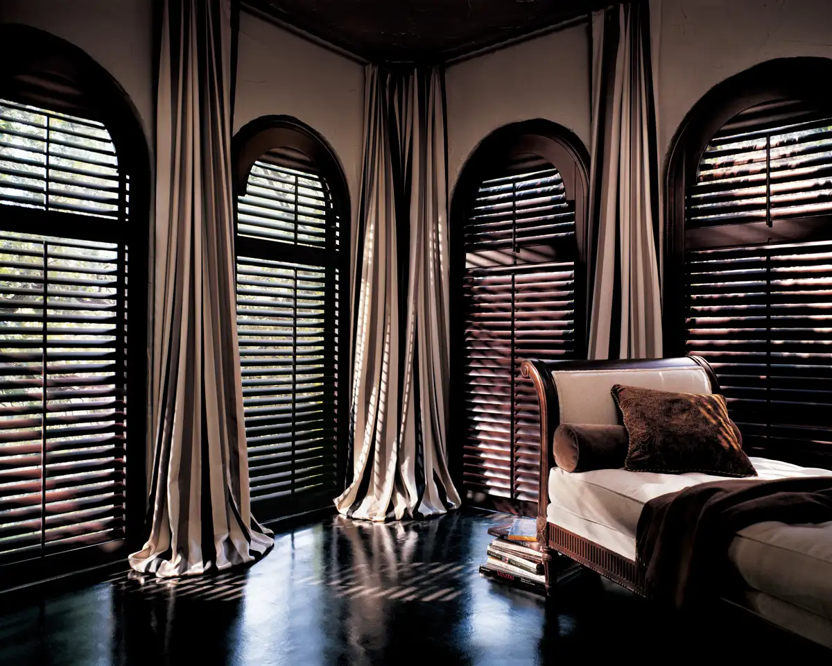Pairing wood shutters and curtains