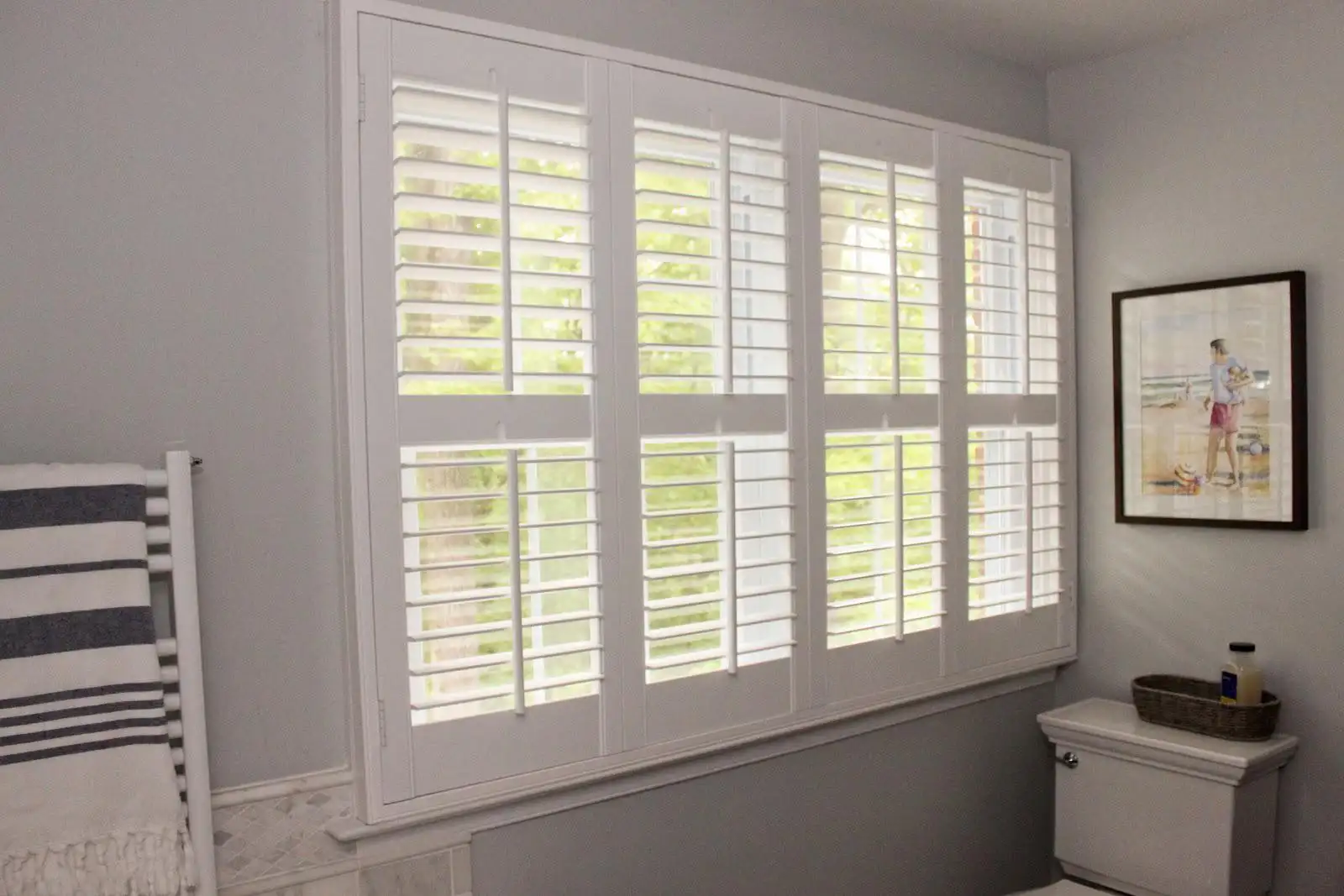 Plantation shutters for bathroom windows